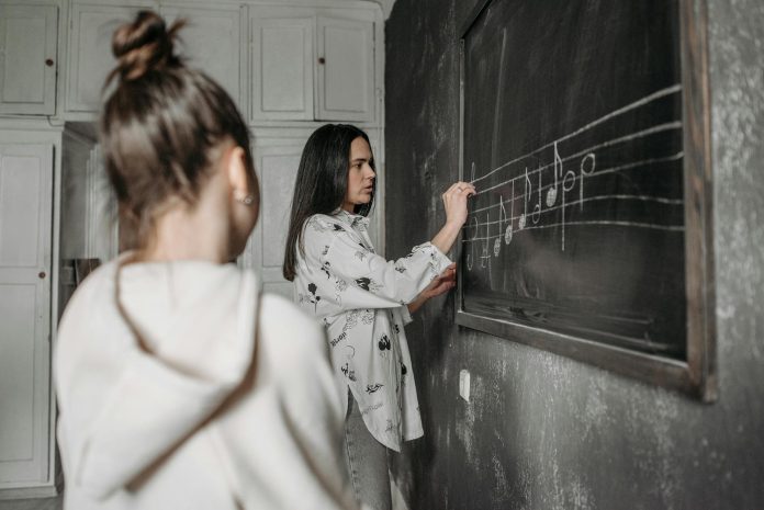 girl on music lesson
